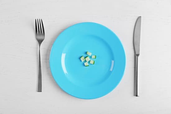 canva pieces of cucumber in a blue plate MAD QqRAciM