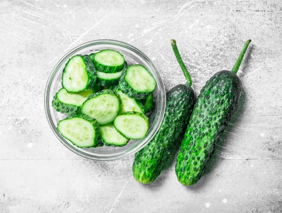 canva pieces of fresh cucumbers in a glass bowl MAEPLYGQ5K0