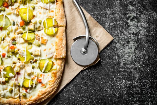 canva pizza with cucumbers and cheese sauce MAEP5C9mt I