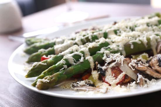 canva plate of asparagus dish with sauce MAD MrVrQf0