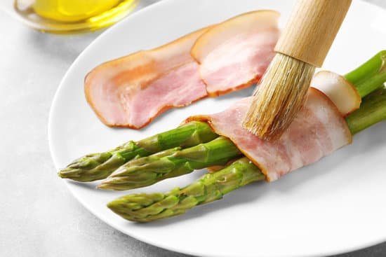 canva plate with bacon wrapped asparagus on light background MAD9UBoMuHI
