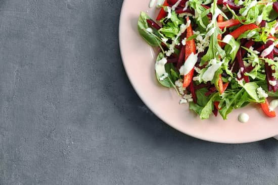 canva plate with fresh beet salad on grey background MAD9bqcISNQ