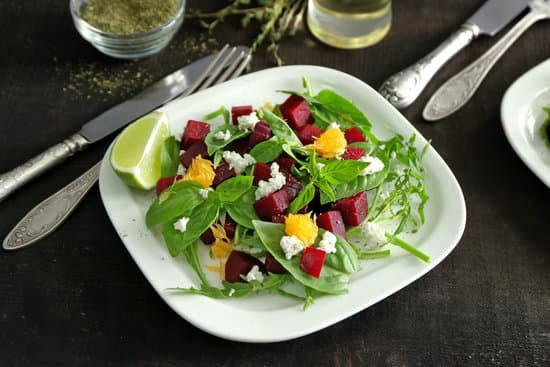 canva plate with useful beet salad on table MAD9bpgYAHI