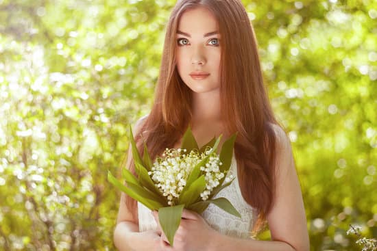 canva portrait of beautiful young woman with lily of the valley MAEO pKI7do