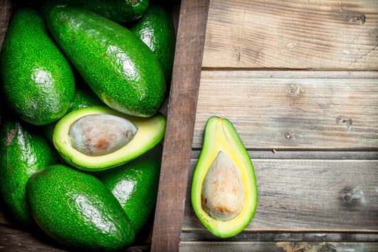 canva ripe avocado in a wooden box. MAEP5GbIvGU