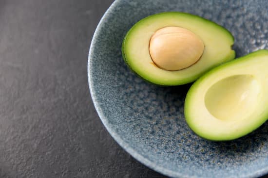 canva ripe avocado with bone in ceramic bowl MAEQQsSo3g0