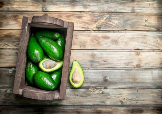canva ripe avocados in a wooden box copy space MAEPoPmHX6w