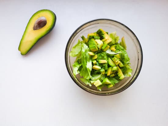 canva salad with avocado and sesame seeds oil is poured MAEPu8qc3uA