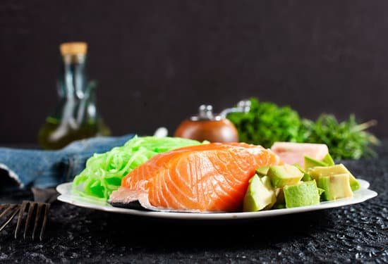 canva salmon with avocado on a plate MAD 1G4y5Sw