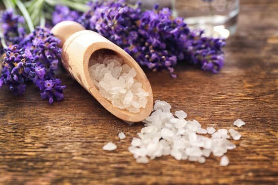 canva sea salt with lavender on wooden background MAD Q2ser9s