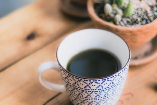 canva selective focus of chlorophyll water healthy drink in vintage cup.