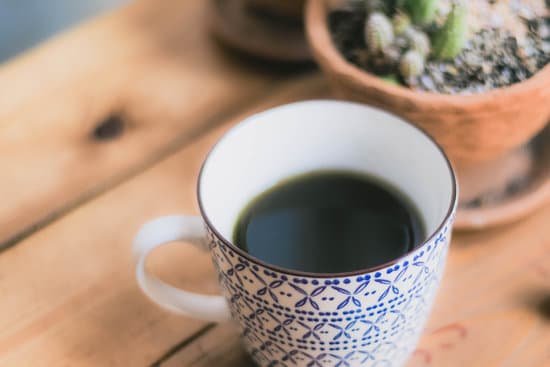 canva selective focus of chlorophyll water in vintage cup. MAEp APXcow