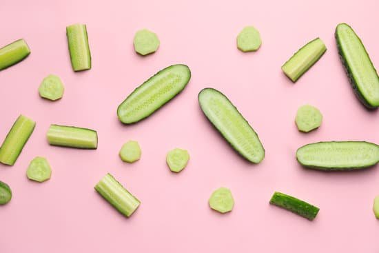 canva sliced and halved cucumbers against a pink background MAD6rAl r s
