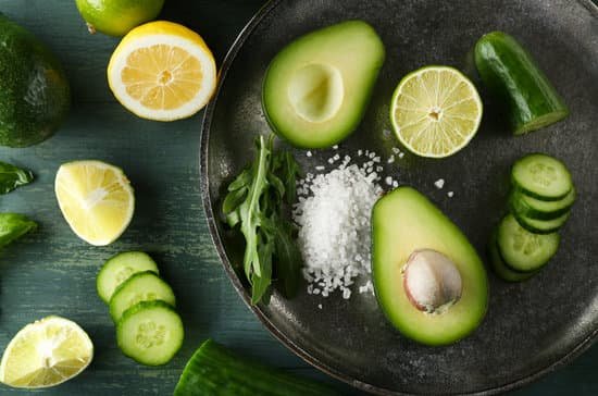 canva sliced avocado cucumber and citrus fruits on a table MAD MRzV254