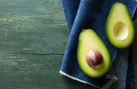 canva sliced avocado on napkin MAD MQddX5o