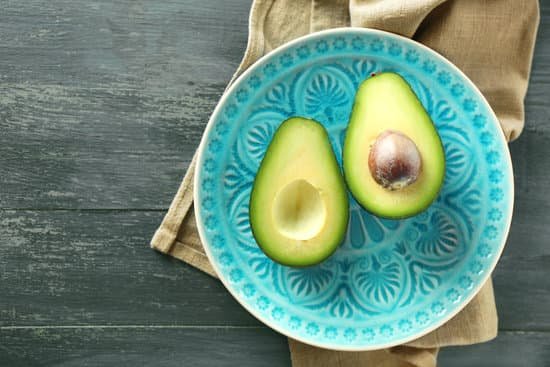 canva sliced avocado on plate MAD MdWjYGc