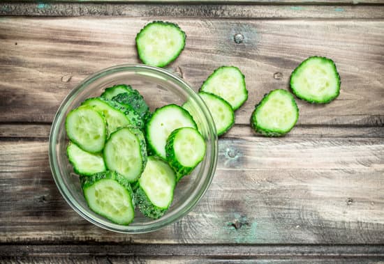 canva sliced cucumber in a bowl MAEPQs nnao