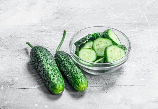 canva sliced cucumbers in a bowl MAEPLJWTMFM