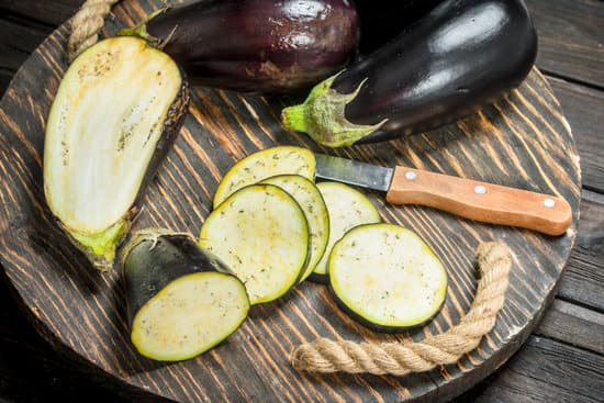 canva sliced eggplants on a wooden board MAEPjzalHEg