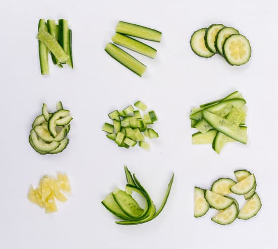 canva slices and chopped cucumber isolated on white MAD gVAjtHQ