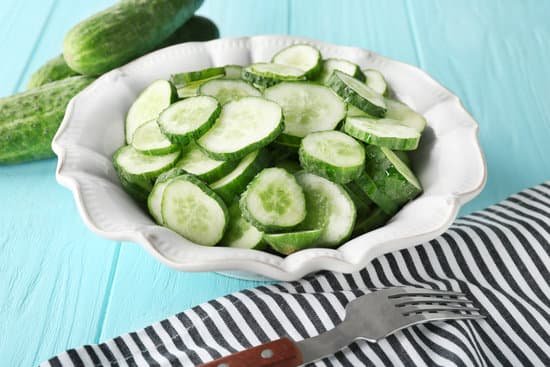 canva slices of cucumber in plate on table MAD9T6gS1aw