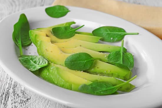 canva slices of fresh avocado on plate closeup MAD QkQiXY8