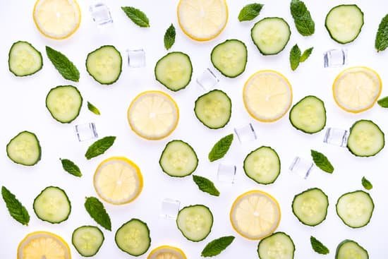 canva slices of lemon and cucumber on a table MAD c6rLCqI