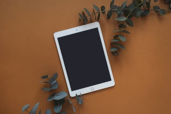 canva tablet with eucalyptus leaves MAEDWYfQ3ds
