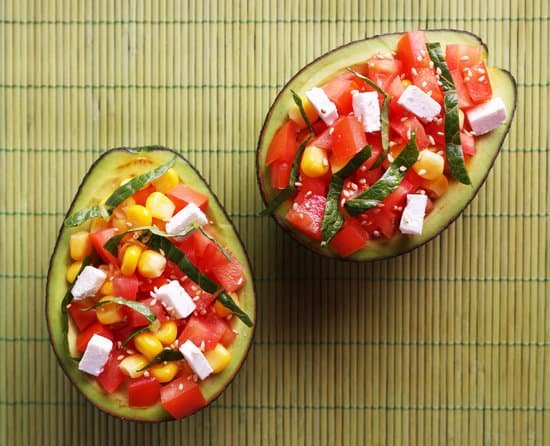 canva tasty salad in avocado on bamboo napkin MAD L7CGayo