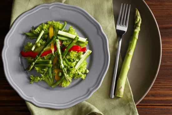 canva tasty salad with asparagus and vegetables on plate MAD Q AQSSc