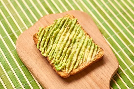 canva toast with avocado on a green background MAEAp85iJDs