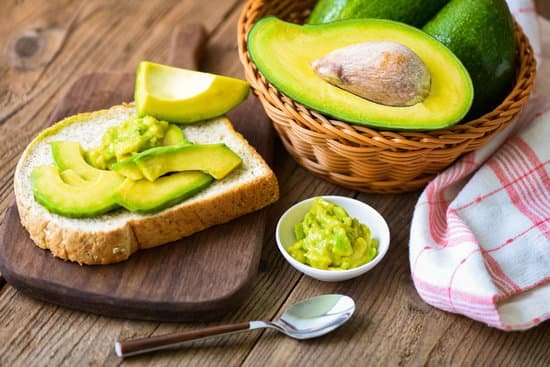 canva toast with avocado on a table MAEAhu47Pco