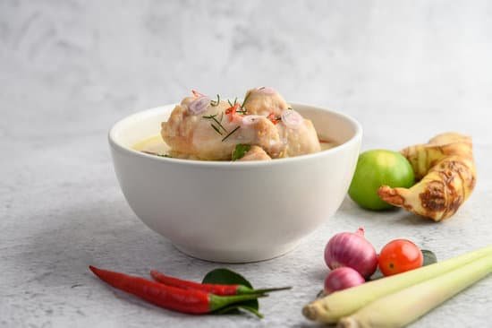 canva tom kha kai in a bowl with kaffir lime leaves lemongrass red o MAD2yCqJj7M