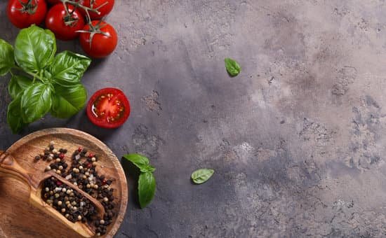 canva tomatoes basil and peppercorns on a table MAD 3YCsWRE