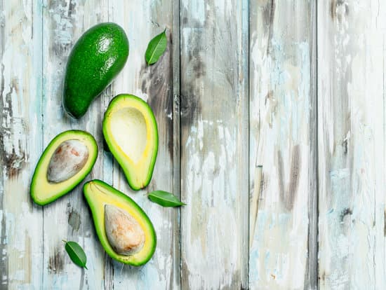 canva top view of avocado and avocado slices MAEPSMXRQ6E