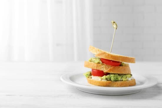 canva vegetarian avocado sandwich on white plate MAD