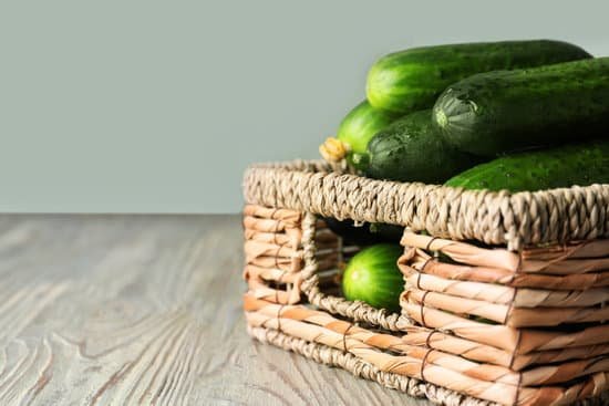 canva wicker box with green cucumbers on table MAD6rMN OQA