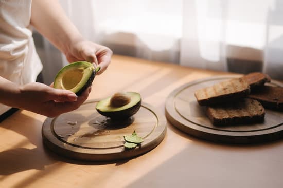 canva woman peeling skin of avocado MAERFRvXdfE