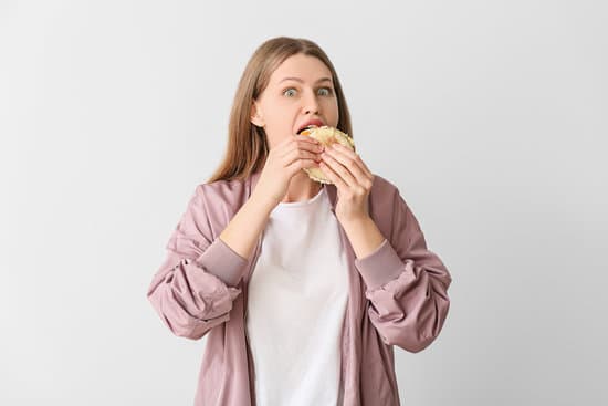 canva woman with problem of strong hunger on light background. diabetes symptoms MAEQkGePM9c