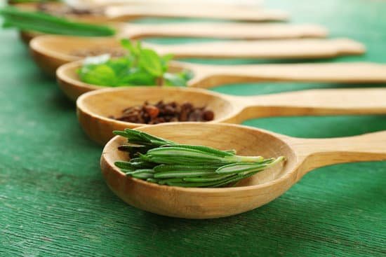 canva wooden spoons with fresh herbs MAD MT8NXYQ