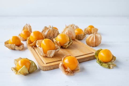 canva yellow gooseberries on wooden board MAEElfqs7yU