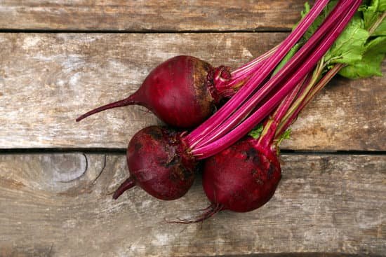 canva young beets on wooden table MAD MYM9C2Q