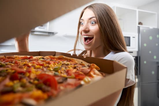 canva young woman eating pizza with pleasure. MAEaOq rSYc