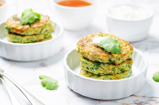 canva zucchini ricotta cilantro fritters with fresh cilantro leaves