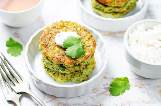 canva zucchini ricotta cilantro fritters with fresh cilantro leaves MADQBz038yo