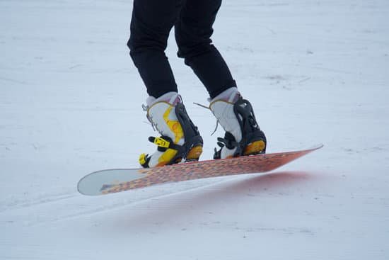 canva a snowboarder rides a snowboard. MADaYrUqAd0