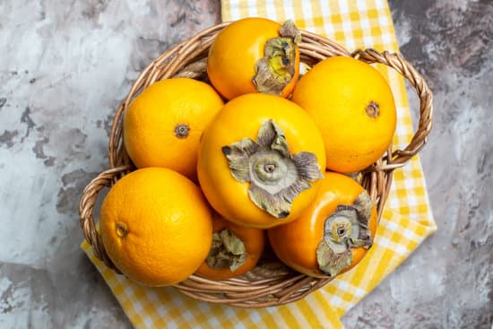 canva basket of fresh persimmons MAEQc1vzUZc