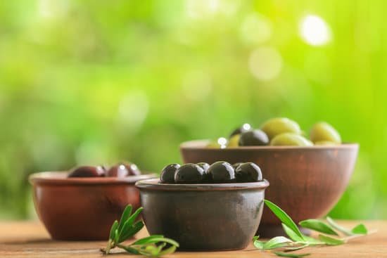 canva bowls with healthy olives on blurred background MAD9T3mF9Qw