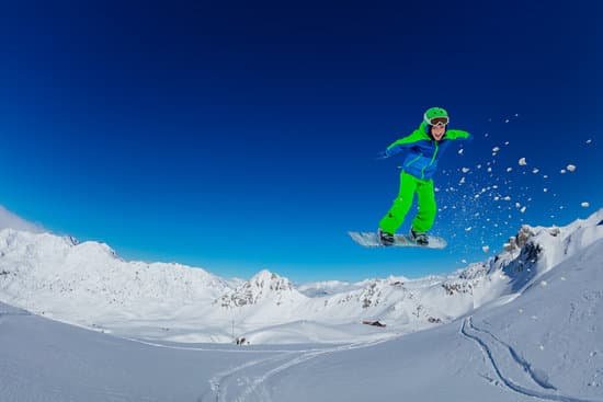 canva boy on snowboard riding downhill MAD ggKcOnA