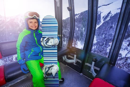 canva boy with snowboard in ski lift MAD gsUEeqo